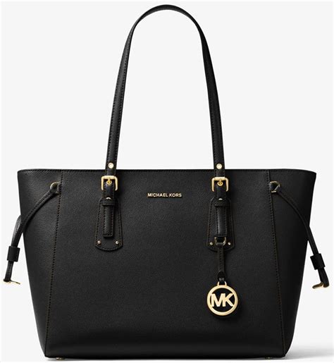 fake michael kors handbag emblem|michael kors bag original.